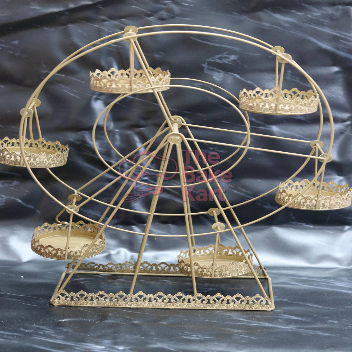 Gold wheel cake stand detail